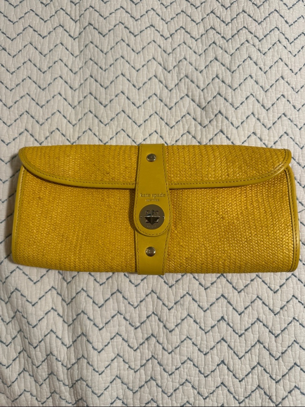 kate spade yellow woven turn-lock clutch